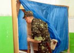"Коммерсант". На местных выборах сохранили голоса военных